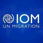 IOM logo in a blue background